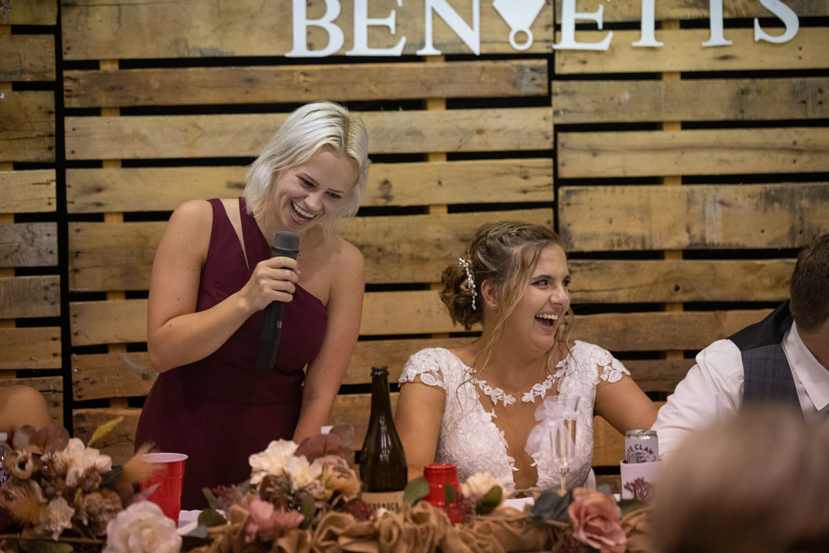 Bride laughs during speeches