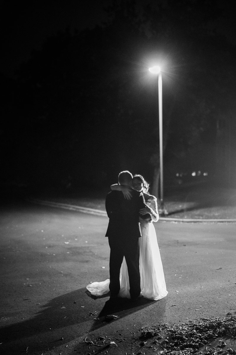 Bride and Groom first dance under a streetlight