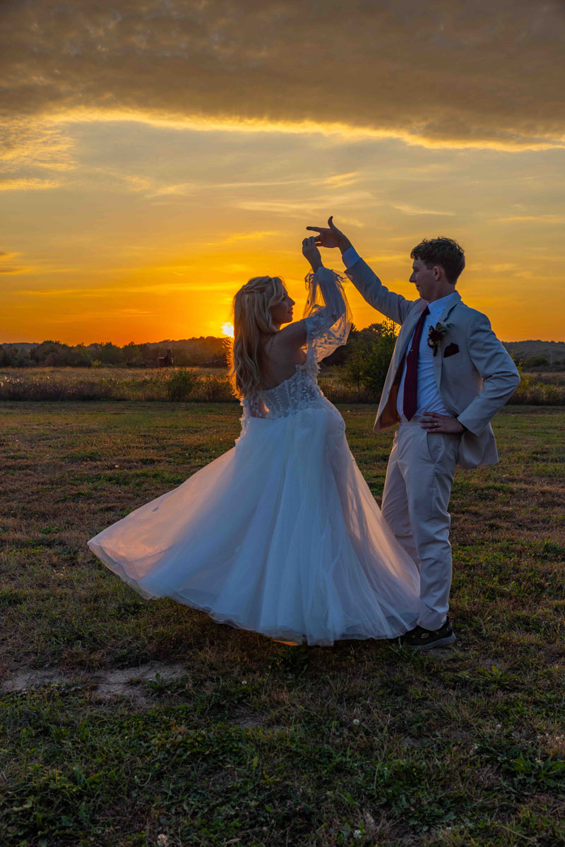 Spin by bride and Groom in a golden hour sunset