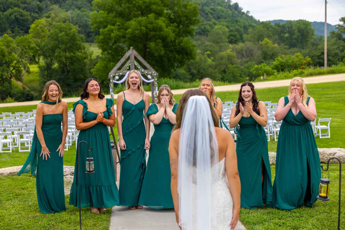 First reveal of a wedding dress to the bridesmaids