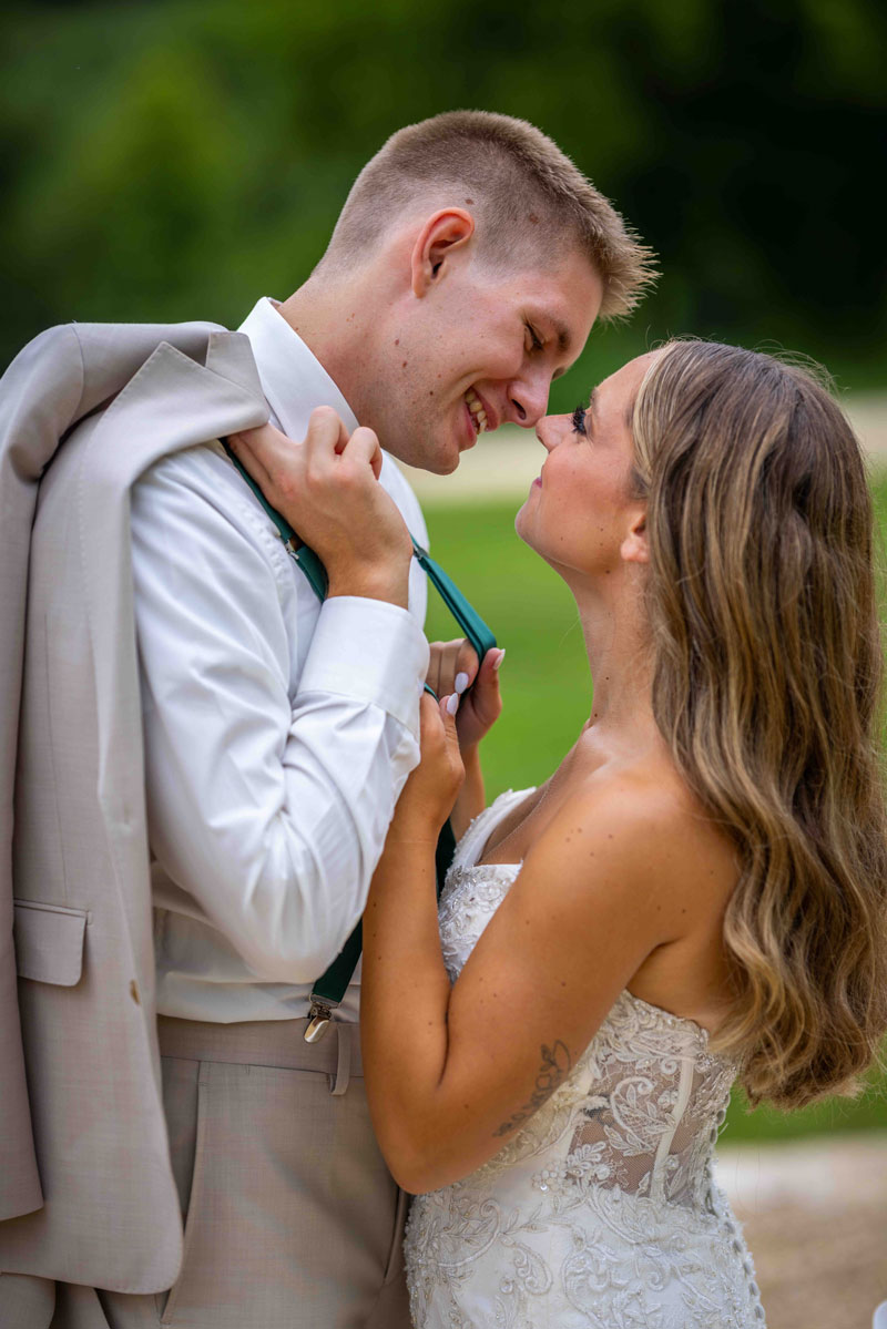Grace and Collin go in for a kiss at their wedding
